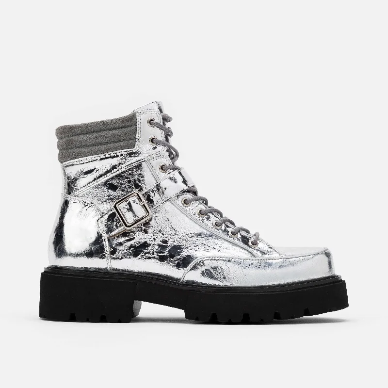 Women's open - toe fashion & dress shoes with a cork - wrapped heel for a summer - friendly style Ms. Atlas Chrome Patent Leather Strap Boots Women's open - toe fashion & dress shoes with a cork - wrapped heel for a summer - friendly style Ms. Atlas Chrome Patent Leather Strap Boots