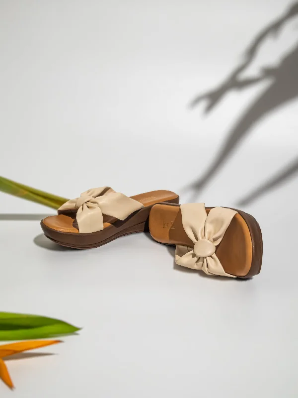 Women's Sandals with a Wedge Heel and a Tassel Detail in Orange for a Trendy LookWomen Beige Solid Wedge Sandals