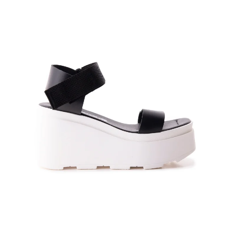 Women's Sandals with a Wedge Heel and a Tassel Detail in Orange for a Trendy LookMyo Black Leather